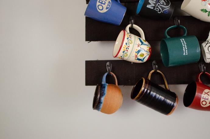 blue and brown ceramic mugs